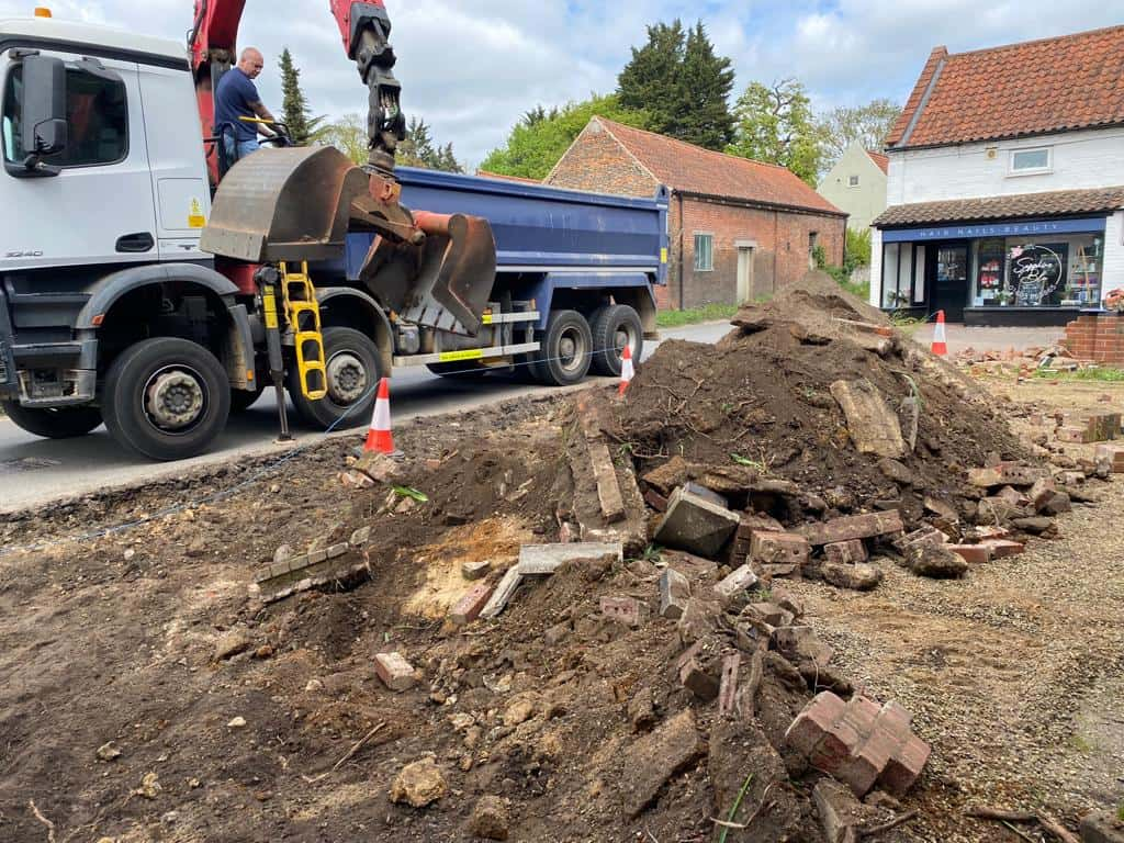 This is a photo of a dig out being carried out for the installation of a new tarmac driveway. Works being carried out by NS Driveways Ashtead