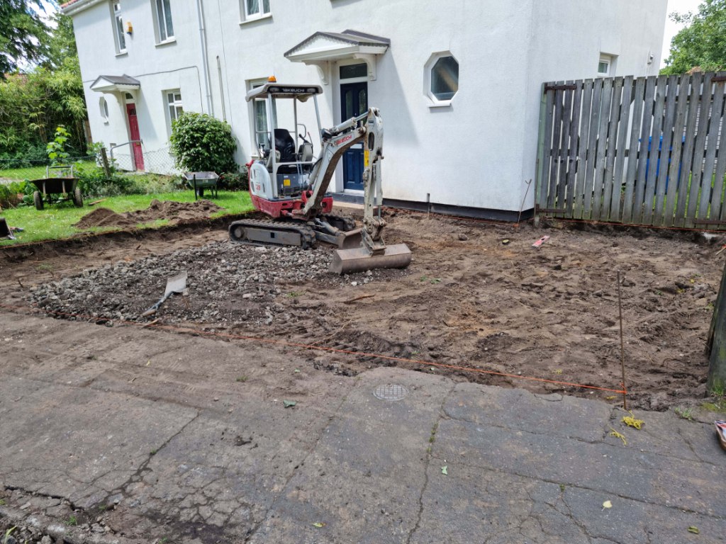 This is a photo of a dig out being carried out by NS Driveways Ashtead in preparation for a block paving driveway