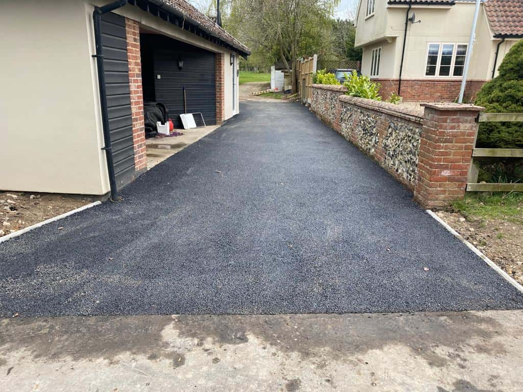 This is a newly installed tarmac driveway. All works carried out by NS Driveways Ashtead