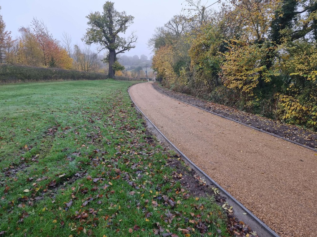 This is a large driveway which has just had a tar and chip driveway installed on by NS Driveways Ashtead