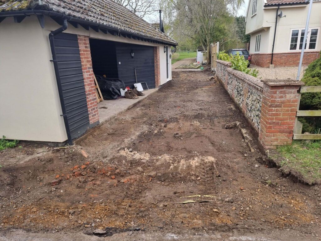 This is a tarmac driveway that is in the process of being dug out and installed by NS Driveways Ashtead